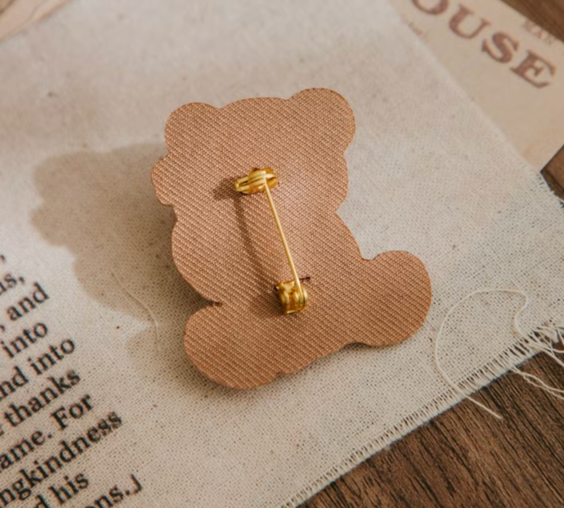 wwiinngg Embroidered Pin - Stamping Teddy Bear
