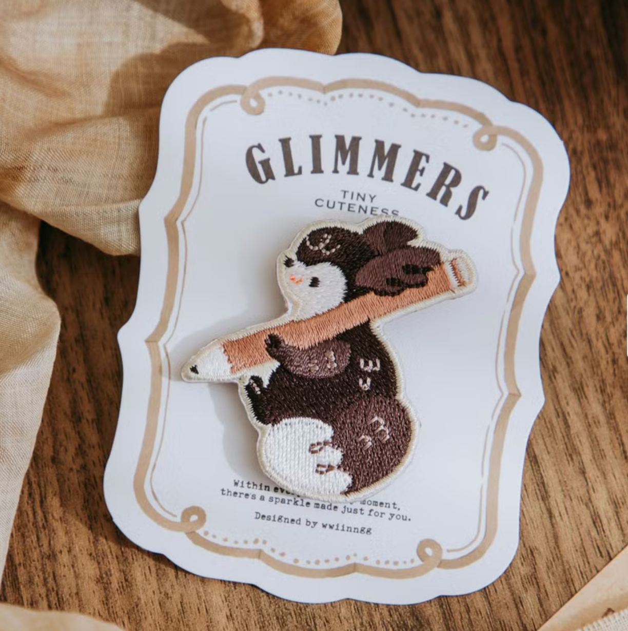 wwiinngg Embroidered Pin - Writing Black Squirrel